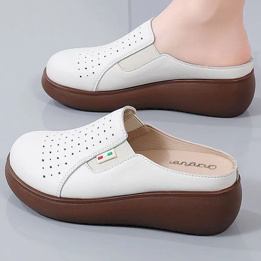 Pantuflas cerradas de piel auténtica con suela blanda