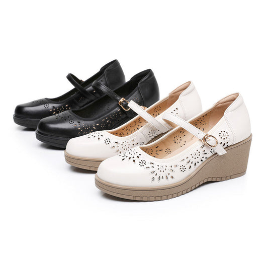 Zapatos de cuero con cuña y agujeros huecos
