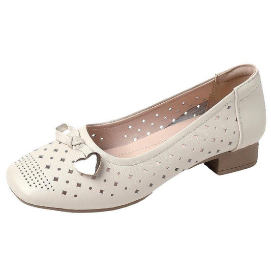 Zapatos de piel con perforaciones y suela suave
