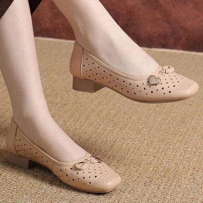 Zapatos de piel con perforaciones y suela suave